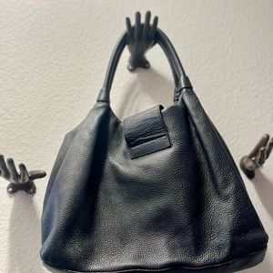 Kate Spade black leather shoulder purse.